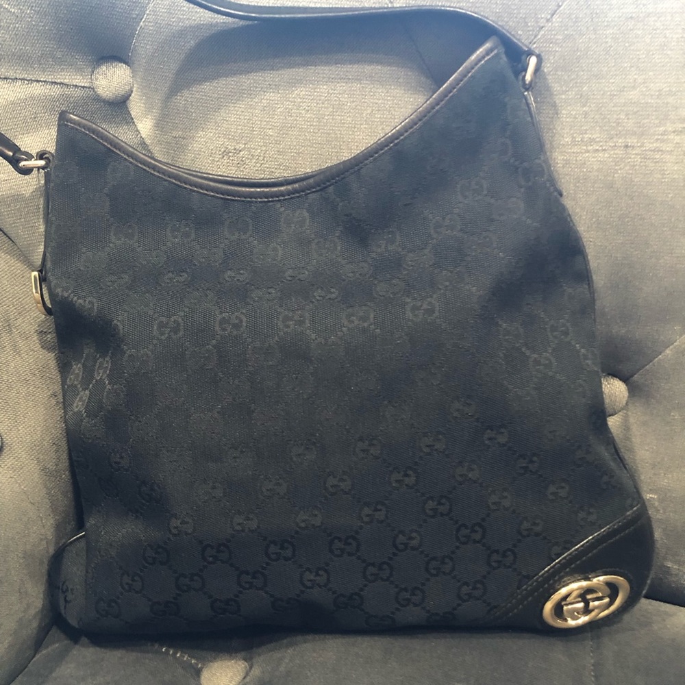 Gucci monogram pocket book